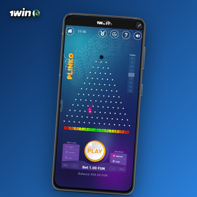 1Win Plinko game on low risk with 8-row board and green central multipliers